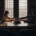 A lawyer helps partners finalize a partnership dissolution agreement with a handshake.
