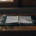An open binder with notes and a pen, organizing the evidence needed to contest a will.