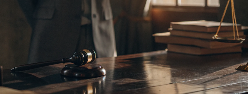 Gavel and scales of justice on a lawyer's desk for a partition action.