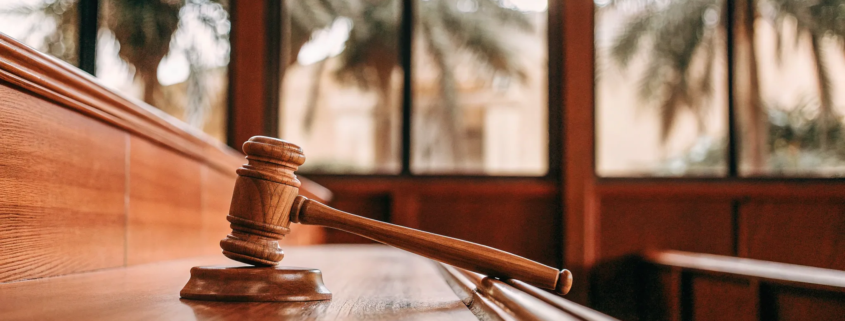 A judge's gavel on a bench, setting the deadline for how long you have to contest a will in Florida.