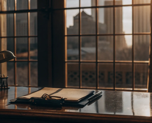 A lawyer's desk with documents for a real estate non-disclosure case.