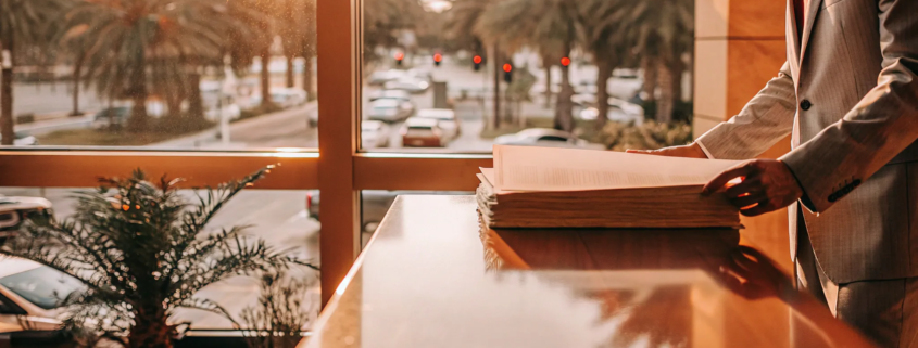 Landlord reviewing legal documents for a Florida commercial eviction process.