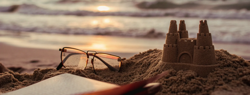 A book and eyeglasses on a beach, explaining the steps on how to contest a will.