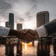 A Tampa business breakup attorney helps partners finalize their dissolution with a handshake.