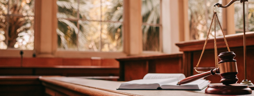 Gavel and scales of justice for Florida's breach of contract statute of limitations.