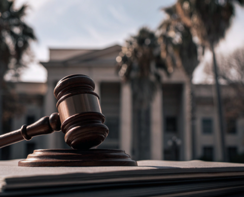 Gavel on legal documents showing how long a quiet title action takes in Florida.