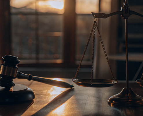 A gavel and scales of justice determining how much sellers get from the NAR settlement.