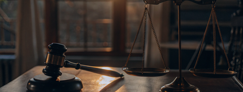 A gavel and scales of justice determining how much sellers get from the NAR settlement.