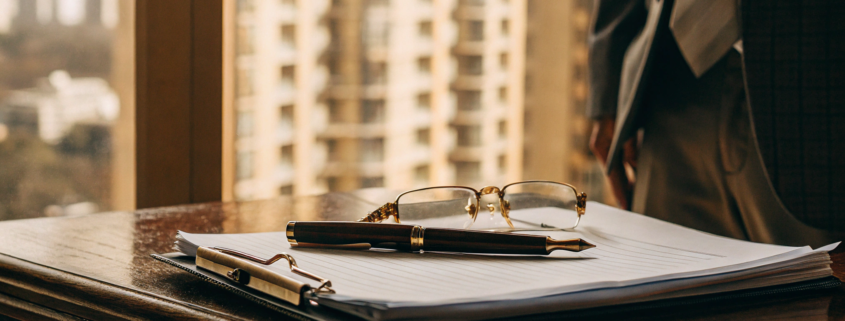 A real estate attorney reviews a property contract before closing.