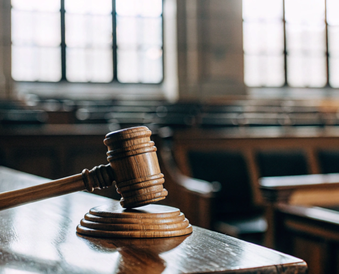 A judge's gavel on a desk, a legal tool for a quiet title action attorney.