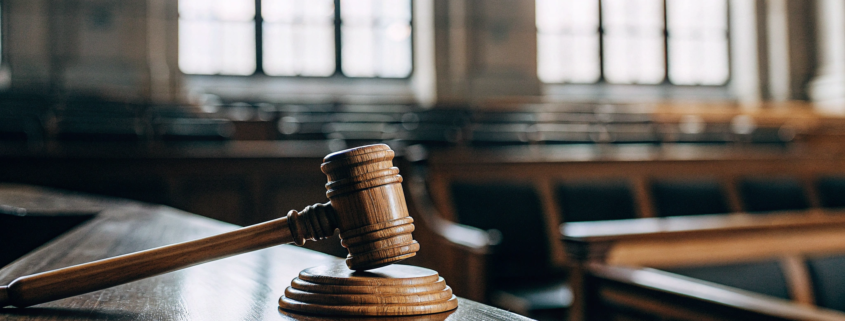 A judge's gavel on a desk, a legal tool for a quiet title action attorney.