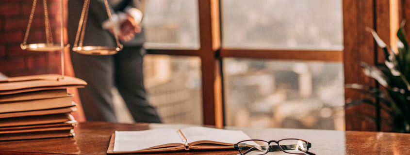 A real estate attorney reviews a property contract before closing.