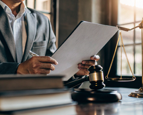 A lawyer specializing in physician contract review examines an employment agreement.