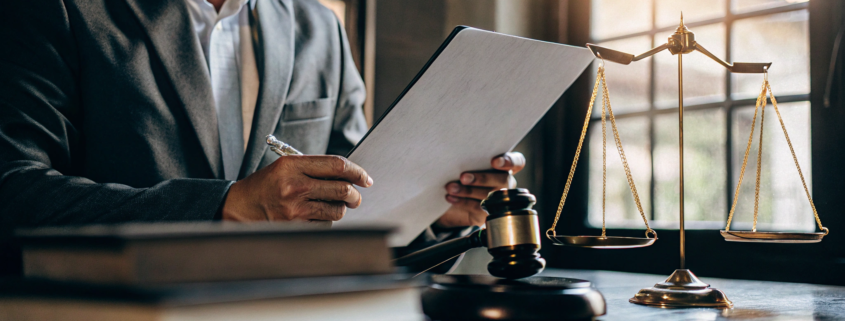 A lawyer specializing in physician contract review examines an employment agreement.